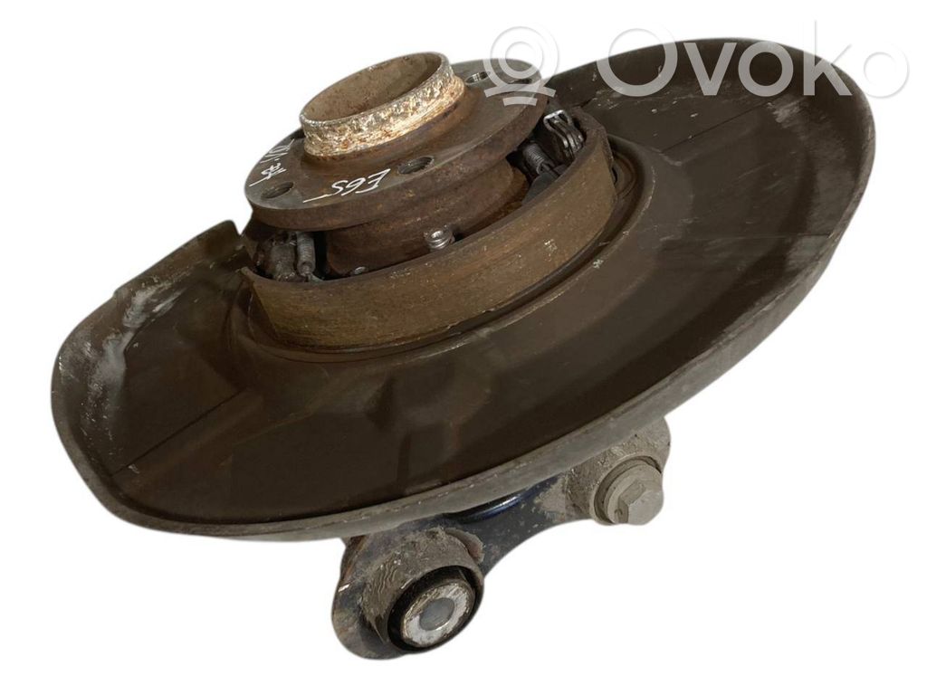 Aizmugurē riteņa rumbas vārpstas šarnīrs (stupica, capfa)