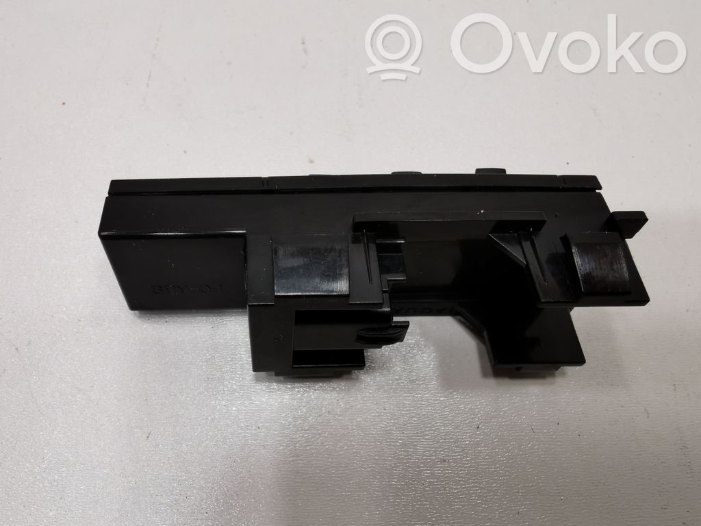 Glove box opening button