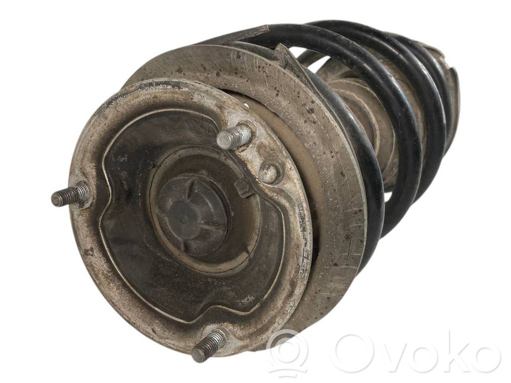 Priekšpusē amortizators ar atsperi