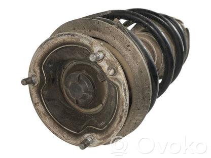 Priekšpusē amortizators ar atsperi