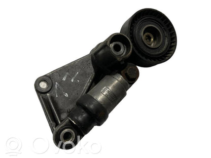 Alternator belt tensioner