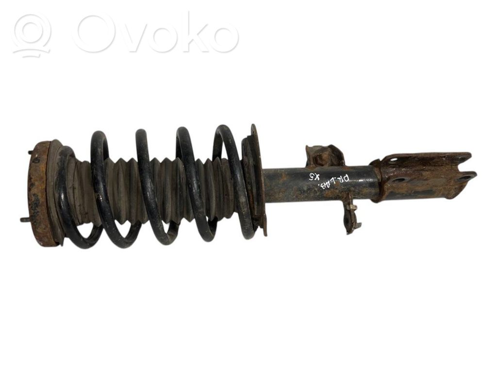 Front shock absorber with spring