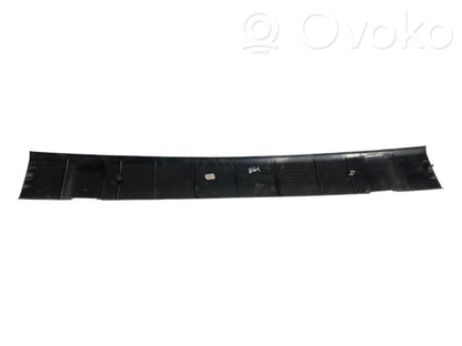 Upper decorative trim (near the window)