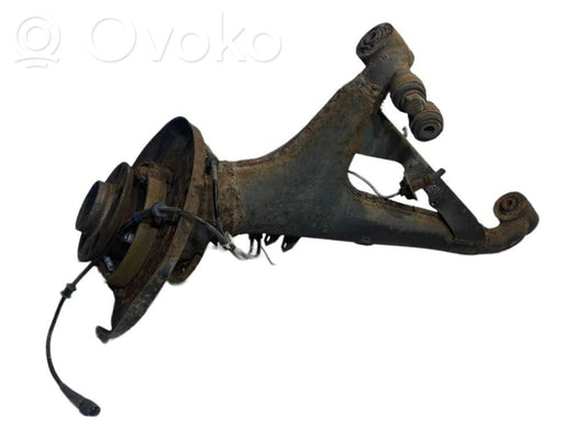 Aizmugurē riteņa rumbas vārpstas šarnīrs (stupica, capfa)