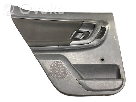 Apšuvums aizmugurējām durvīm