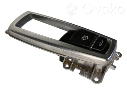 Rokas bremzes slēdzis