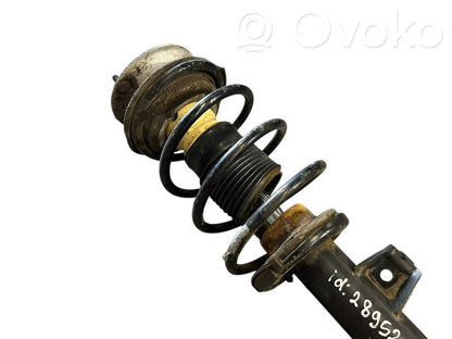 Priekšpusē amortizators ar atsperi