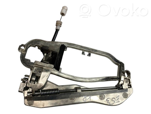 Holder/bracket for external opening handle at the front