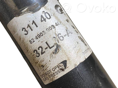 Priekšpusē amortizators ar atsperi