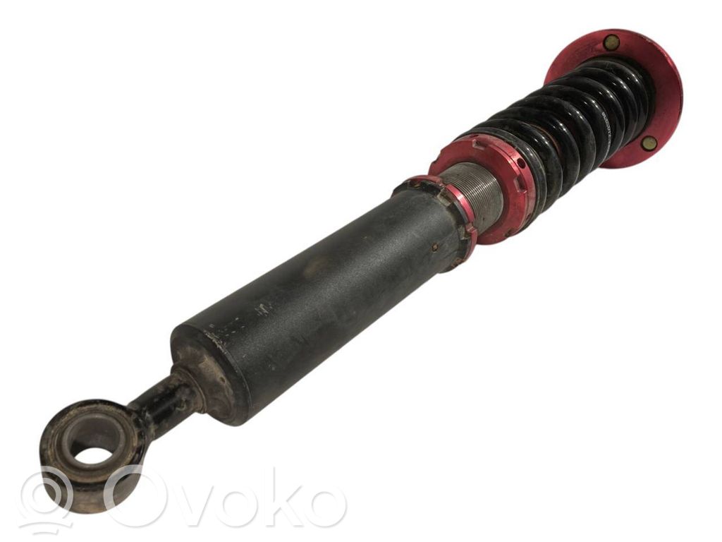 Rear shock absorber with spring