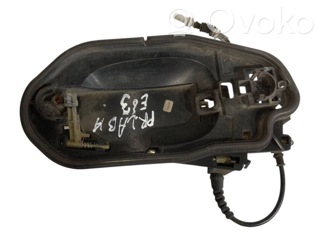 Holder/bracket for external opening handle at the front