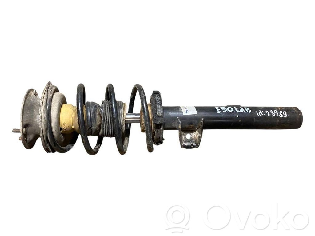 Priekšpusē amortizators ar atsperi