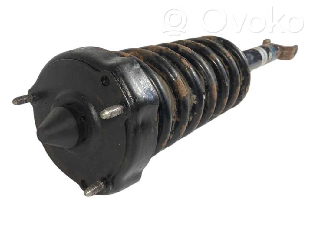 Priekšpusē amortizators ar atsperi