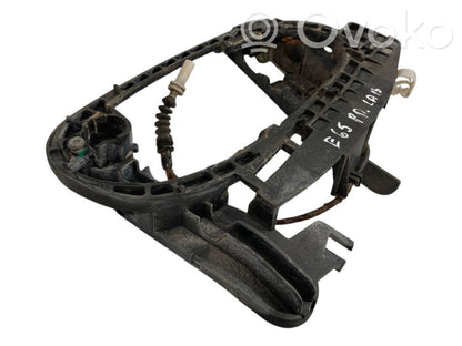 Holder/bracket for external opening handle at the front