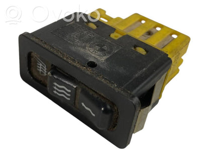 Sēdekļu apsildes slēdzis