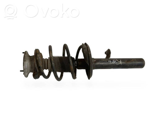 Priekšpusē amortizators ar atsperi