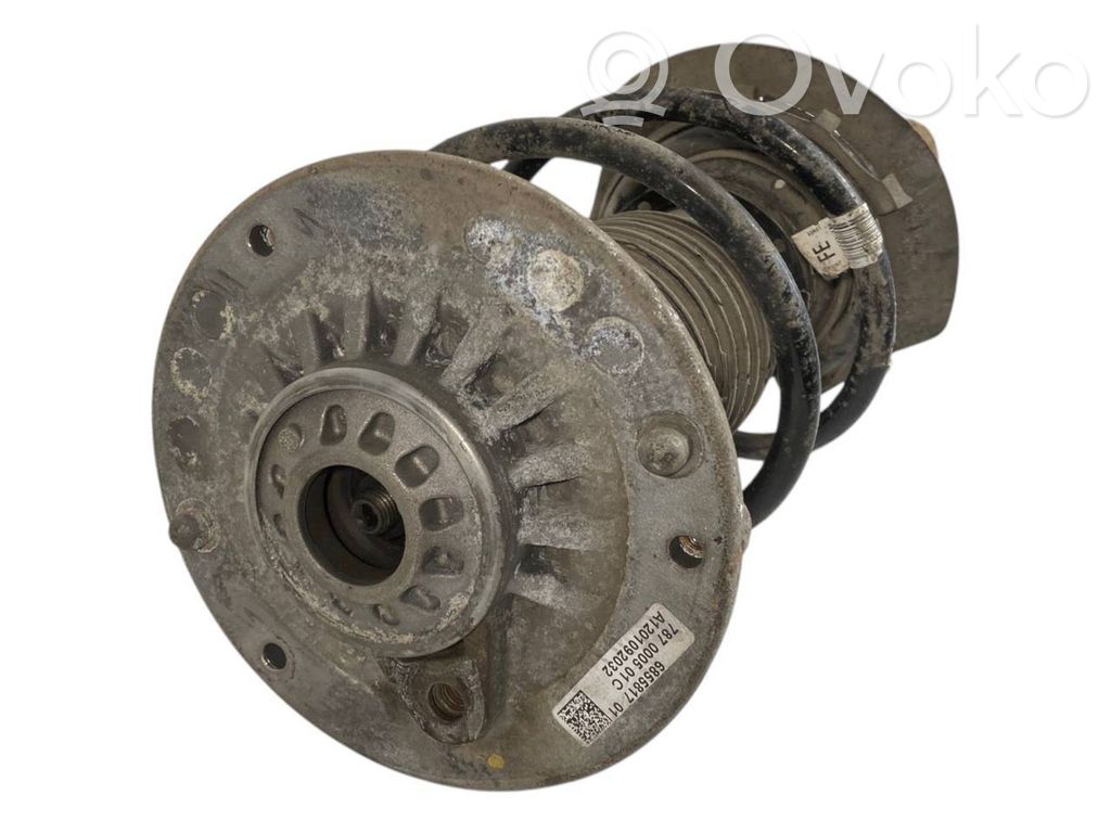 Front shock absorber with spring