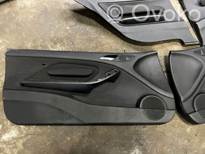 Coupe rear side trim panel