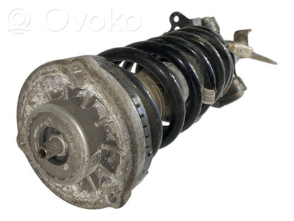 Front shock absorber with spring