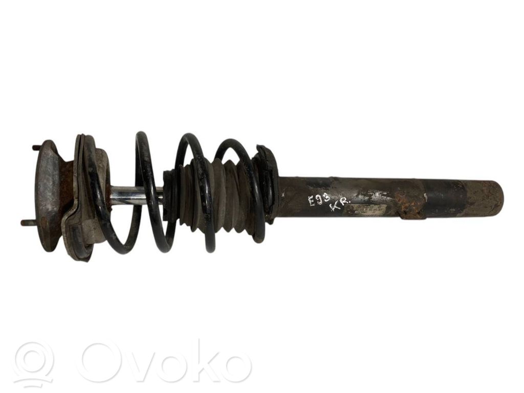 Priekšpusē amortizators ar atsperi