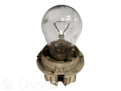 Aizmugures spuldzes vāka turētājs