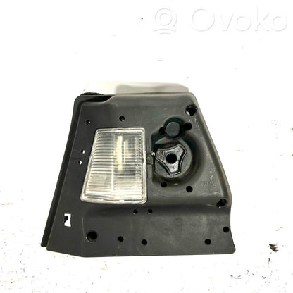 Aizmugures spuldzes vāka turētājs