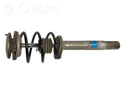 Priekšpusē amortizators ar atsperi