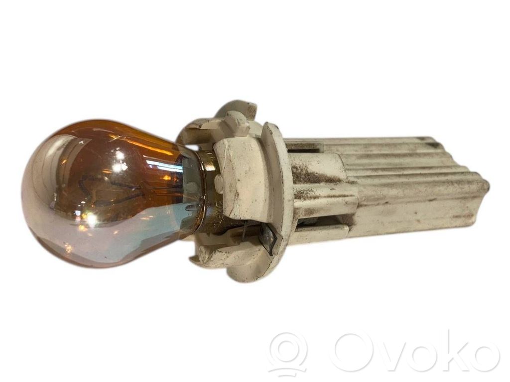 Aizmugures spuldzes vāka turētājs