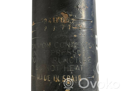 Aizmugurē amortizators ar atsperi