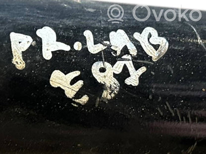 Priekšpusē amortizators ar atsperi