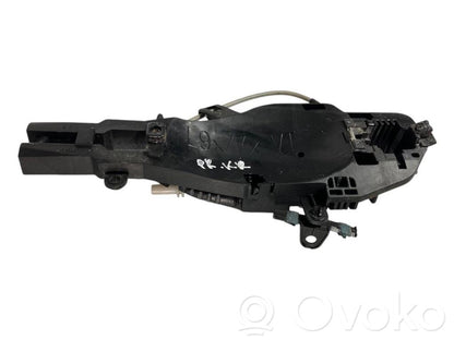 Priekšpusē turētājs / kronšteins ārējam atvēršanas rokturim