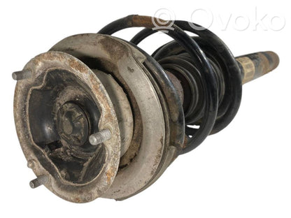 Priekšpusē amortizators ar atsperi