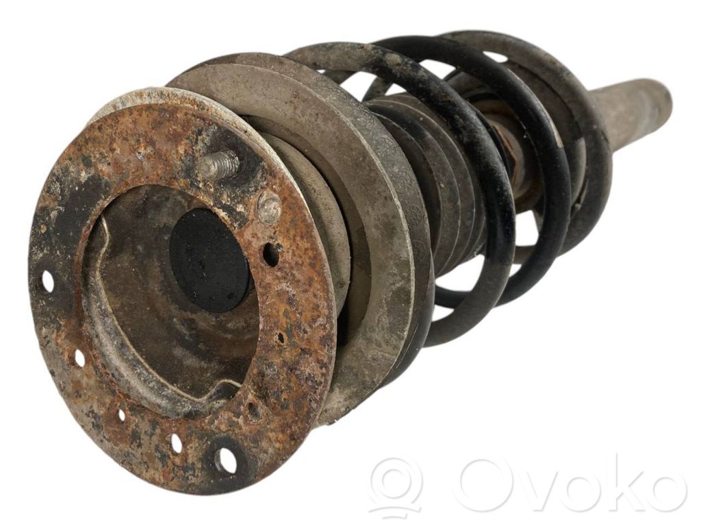 Priekšpusē amortizators ar atsperi