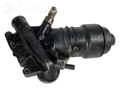 Oil filter holder/cooler