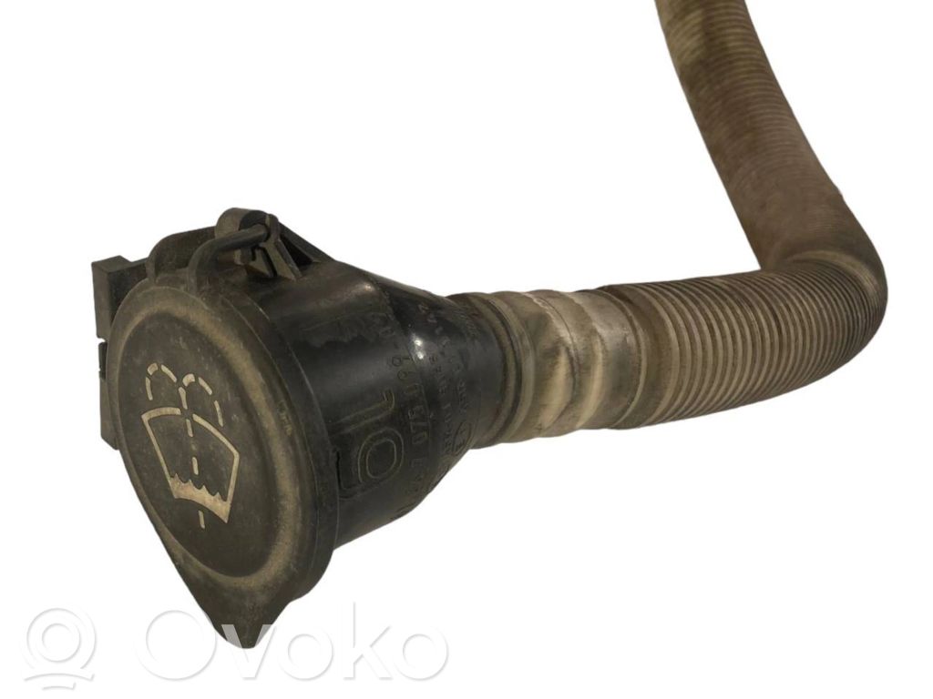Window fluid reservoir filler pipe