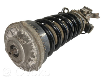 Front shock absorber with spring