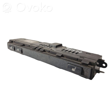 Sēdekļu apsildes slēdzis