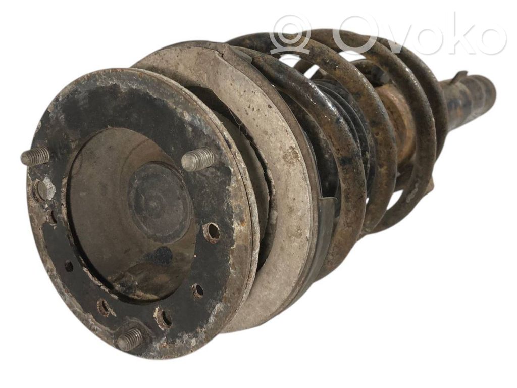 Priekšpusē amortizators ar atsperi