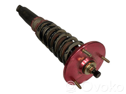 Rear shock absorber with spring