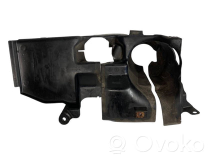 Под защитой двигателя (спереди)