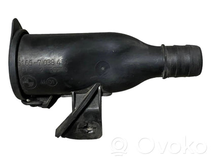 Window fluid reservoir filler pipe