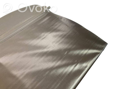 Bagāžnieks logu aizkars