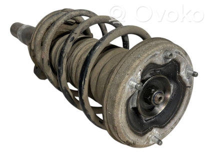 Front shock absorber with spring