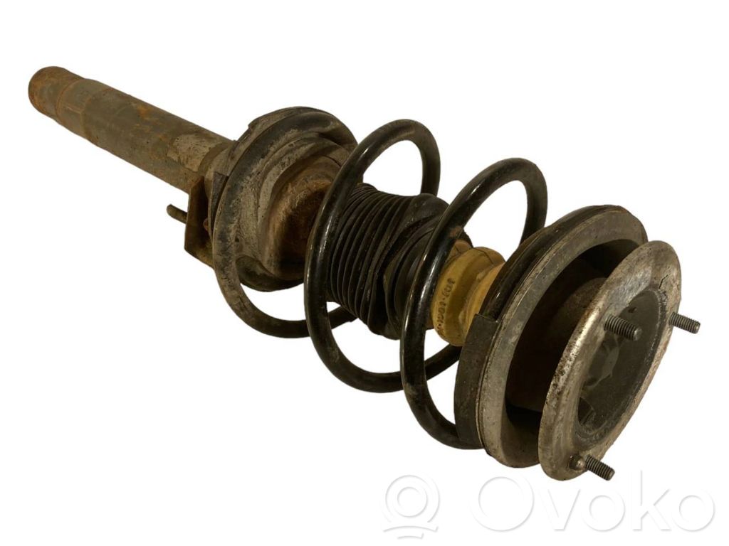 Priekšpusē amortizators ar atsperi