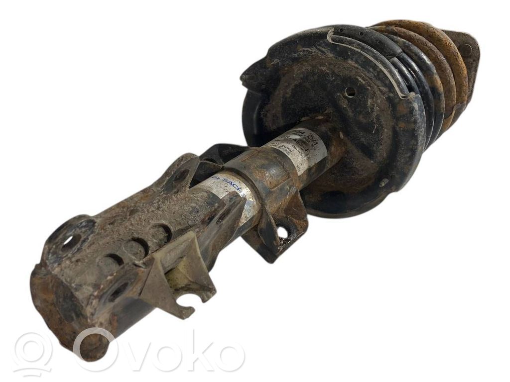 Priekšpusē amortizators ar atsperi