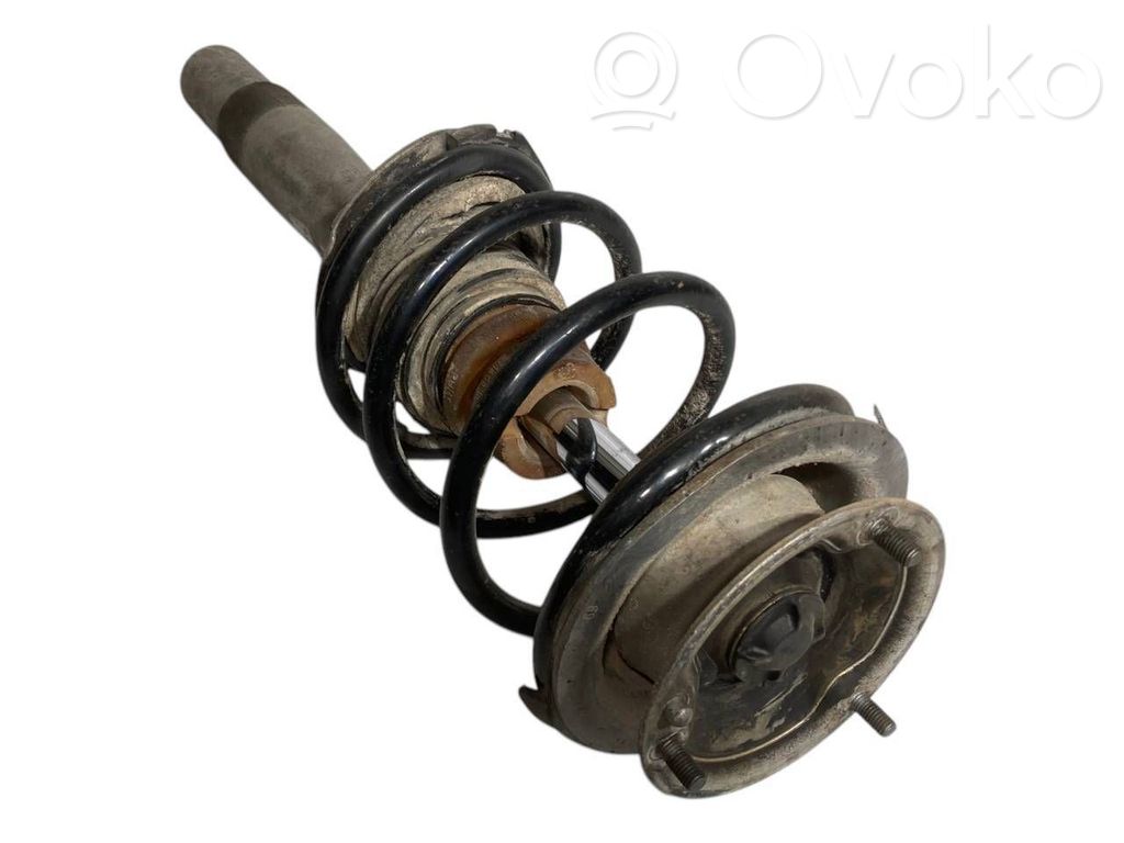 Front shock absorber with spring