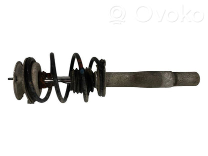 Priekšpusē amortizators ar atsperi