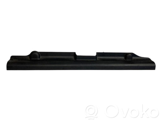 Front passenger seat rail decorative trim
