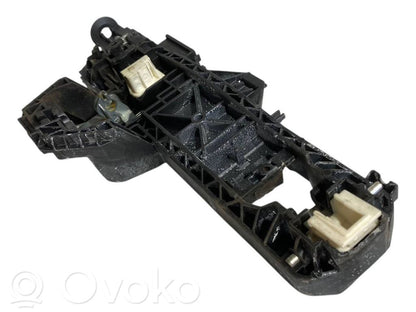 Holder/bracket for external opening handle at the front