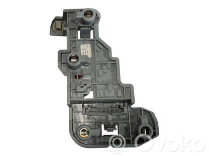 Aizmugures spuldzes vāka turētājs